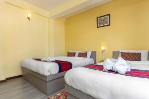 Postel nebo postele na pokoji v ubytování Thamel Hotel & Spa