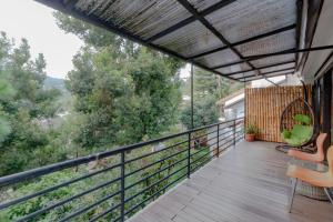a balcony of a house with a view at Family Only Villa Mountain View - De Reiz Kesuma Syariah 3BR in Bandung