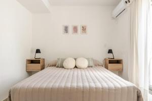 Postel nebo postele na pokoji v ubytování Alma Malbec Mendoza, comfortable apartment