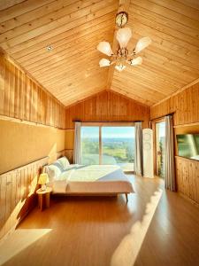 Postel nebo postele na pokoji v ubytování Jeju Smile Pension + 10 fotografií