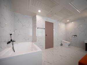 Koupelna v ubytování Hotel Suop