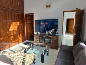 TV a/nebo společenská místnost v ubytování vera home stay