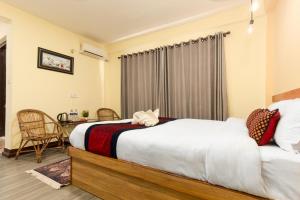 Katil atau katil-katil dalam bilik di Thamel Hostel & Spa