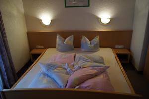 Postel nebo postele na pokoji v ubytování Ferienhaus Alpenroyal