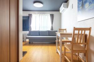 Posezení v ubytování 67 Apt Waseda Shinjuku
