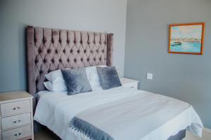 Ένα ή περισσότερα κρεβάτια σε δωμάτιο στο Karabelo guesthouse +30 φωτογραφίες