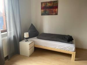 Postel nebo postele na pokoji v ubytování Gemütliche 3 Zimmer Wohnung