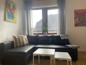 Posezení v ubytování Gemütliche 3 Zimmer Wohnung