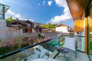 Balkón nebo terasa v ubytování Yueyangli Garden Hotel