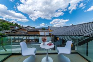 Balkón nebo terasa v ubytování Yueyangli Garden Hotel