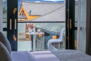 Balkón nebo terasa v ubytování Yueyangli Garden Hotel