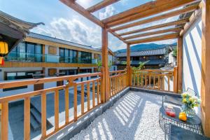 Balkón nebo terasa v ubytování Yueyangli Garden Hotel