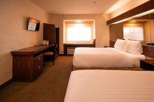 Postel nebo postele na pokoji v ubytování Microtel Inn and Suites by Wyndham Ciudad Juarez, US Consulate
