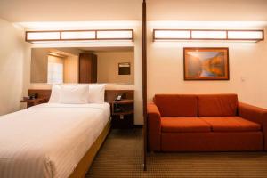 Postel nebo postele na pokoji v ubytování Microtel Inn and Suites by Wyndham Ciudad Juarez, US Consulate