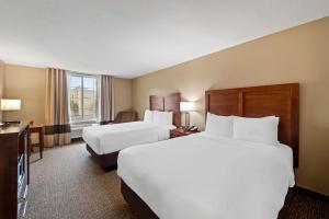 a hotel room with two beds and a window at Comfort Inn & Suites El Centro I-8 in El Centro +24 photos