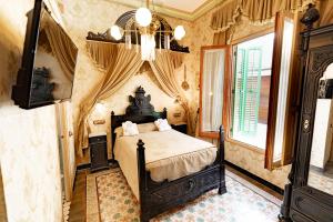 Posteľ alebo postele v izbe v ubytovaní Sitges Royal Rooms