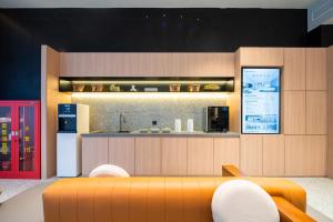 Fotografija v galeriji nastanitve 桔作酒店 大卫城郑州人民医院地铁站店 v mestu Zhengzhou