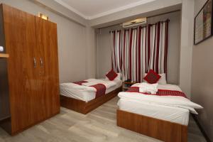 Lova arba lovos apgyvendinimo įstaigoje Bed and Pillow Hostel