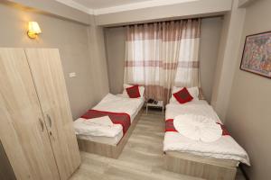 Lova arba lovos apgyvendinimo įstaigoje Bed and Pillow Hostel
