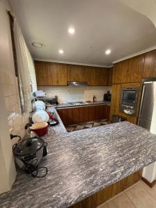 Η κουζίνα ή μικρή κουζίνα στο Bundoora cozy room