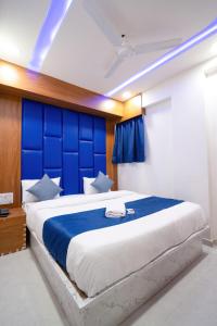 Postel nebo postele na pokoji v ubytování Hotel Nest Sky