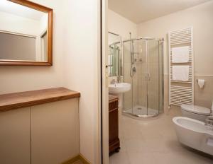 Vonios kambarys apgyvendinimo įstaigoje Borromeo Rooms Bed & Living