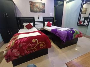 Hotel Devi Darbar客房内的一张或多张床位