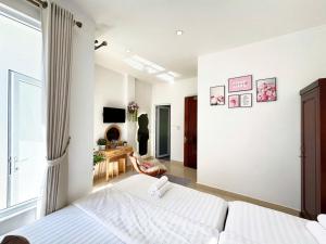Postel nebo postele na pokoji v ubytování My My House Đà Lạt