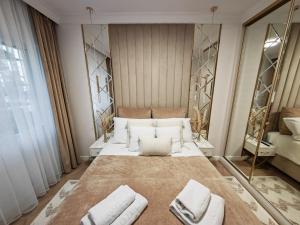 Kúpeľňa v ubytovaní Gold Apartment B29 Let's Sea Baltic Park Gąski