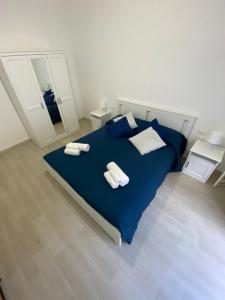 Postel nebo postele na pokoji v ubytování La Casa del Purpaiolo