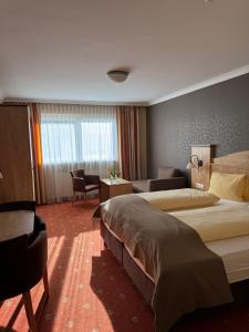 Posteľ alebo postele v izbe v ubytovaní Hotel Mesnerwirt + 25 fotografií