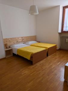 Voodi või voodid majutusasutuse Albergo Spina toas