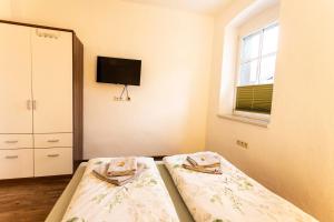 Letto o letti in una camera di Seebühnenblick