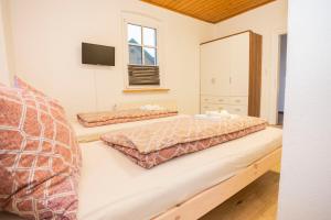 Letto o letti in una camera di Seebühnenblick