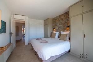 Posteľ alebo postele v izbe v ubytovaní Appartement prestigieux - Pied dans l'eau