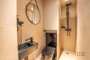 Kúpeľňa v ubytovaní Appartement prestigieux - Pied dans l'eau