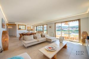 Posedenie v ubytovaní Appartement prestigieux - Pied dans l'eau