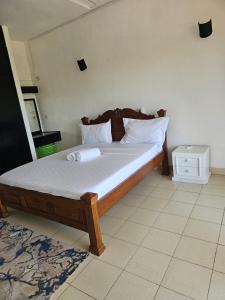 Postel nebo postele na pokoji v ubytování Diani view