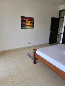 Postel nebo postele na pokoji v ubytování Diani view