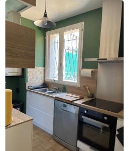 Køkken eller tekøkken på La Maison du Foirail