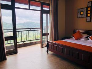 Postel nebo postele na pokoji v ubytování Riverdale Ridge Homestay