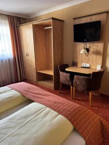 Posteľ alebo postele v izbe v ubytovaní Hotel Mesnerwirt