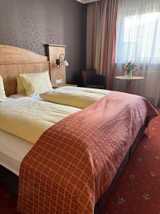 Posteľ alebo postele v izbe v ubytovaní Hotel Mesnerwirt