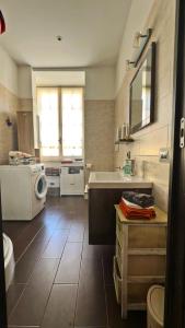 Koupelna v ubytování Dalla Spiaggetta a Quinto