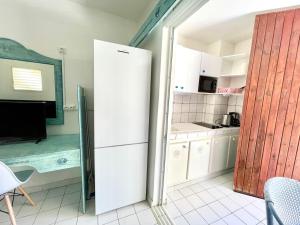 O bucătărie sau chicinetă la Appartement à proximité de la plage +12 fotografii