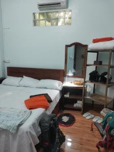 Postel nebo postele na pokoji v ubytování Bar Ang Guesthouse