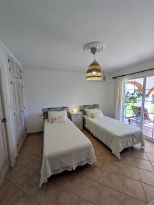 Postel nebo postele na pokoji v ubytování Finca Villordo Villa Tranquila + 37 fotografií