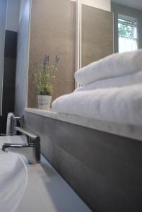 Postel nebo postele na pokoji v ubytování Mimì B&B