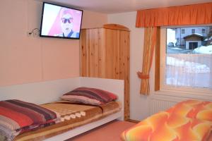 Postel nebo postele na pokoji v ubytování Pension Haus Rohrmoser