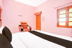 Postel nebo postele na pokoji v ubytování OYO 8195 Marine Guest House